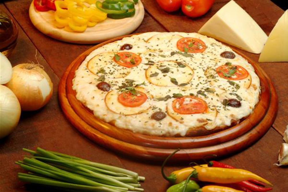 Charles Pizza Grill Ltda
